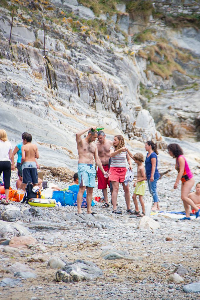 Drinking Asturian Sidra at the beach