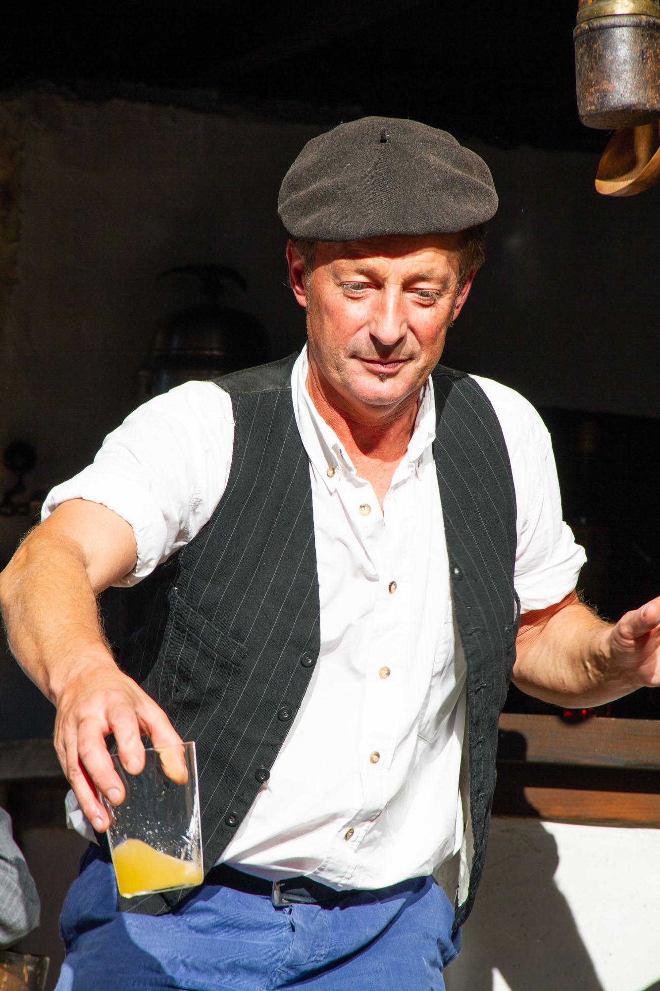 Man serving Asturias Sidra