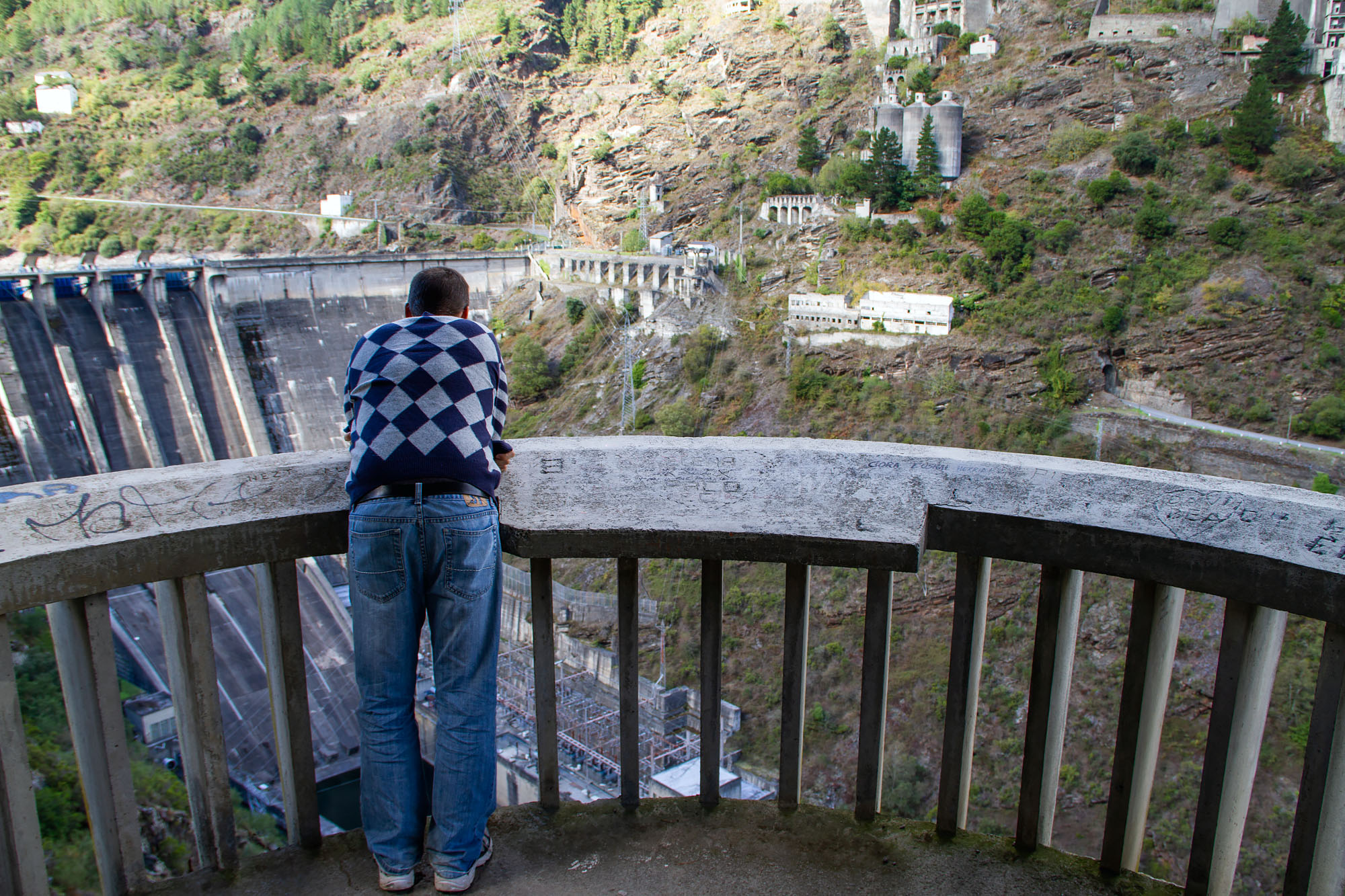 Man overlooking dam Asturias