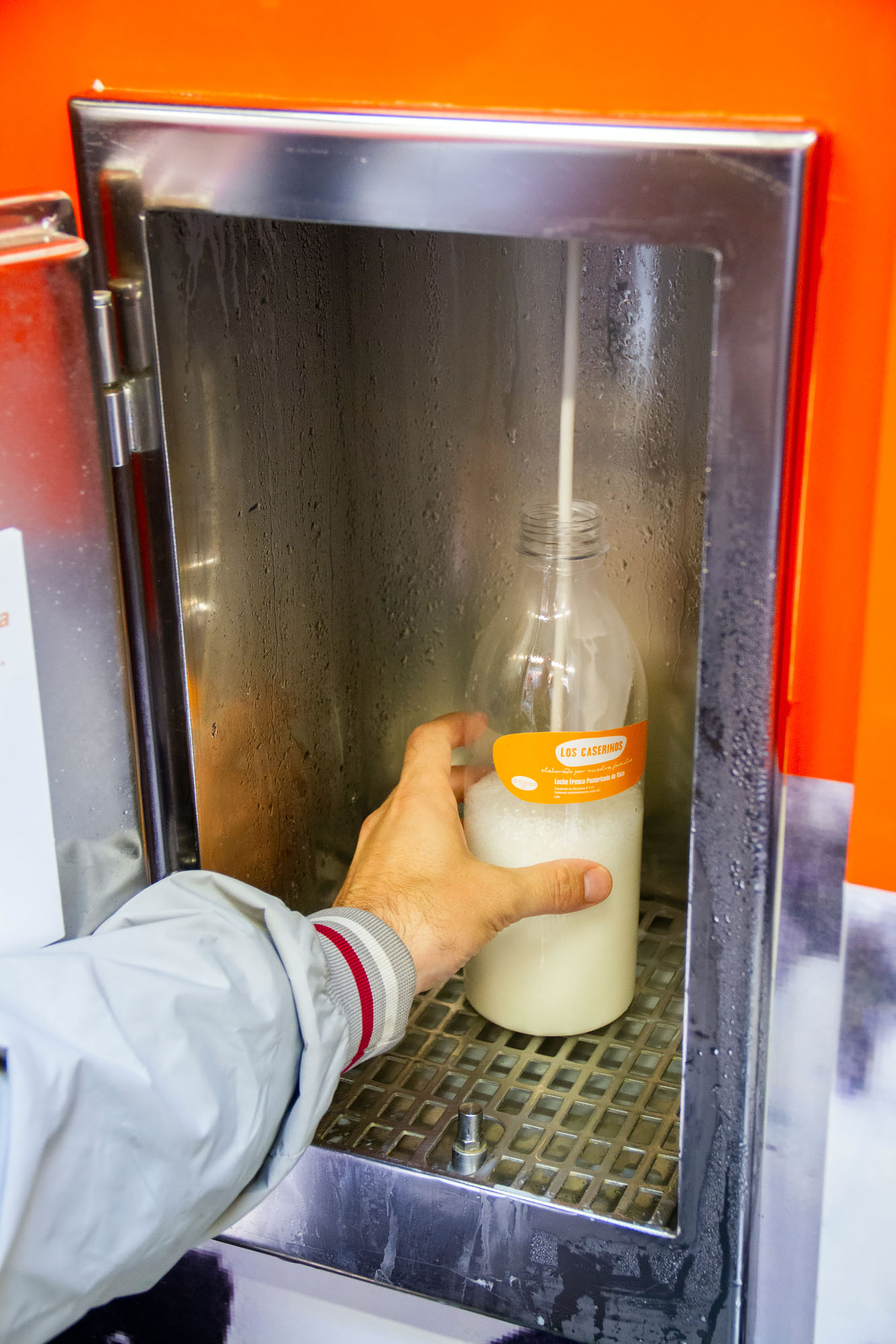 Pumping milk into glass bottle vending machine