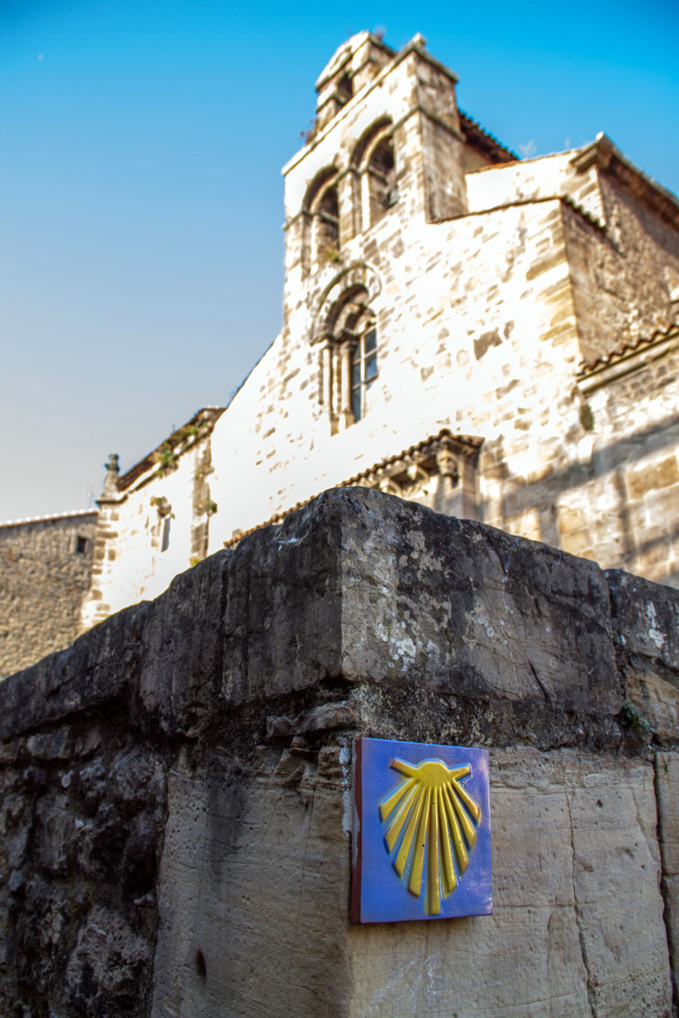 Camino de Santiago yellow shells sign